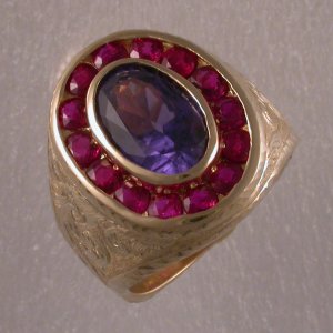 18Kt hand engraved sapphire and ruby ring