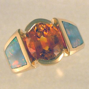 JR130- 14kt yellow gold ring with 3.5ct orange sapphire and opal inlay