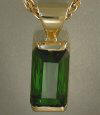 14KT yellow pendant with 9.98 ct green tourmaline