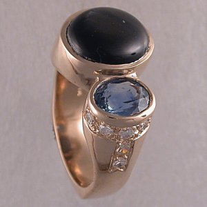 14KT custom ring w/black star sapphire, diamonds, blue sapphire