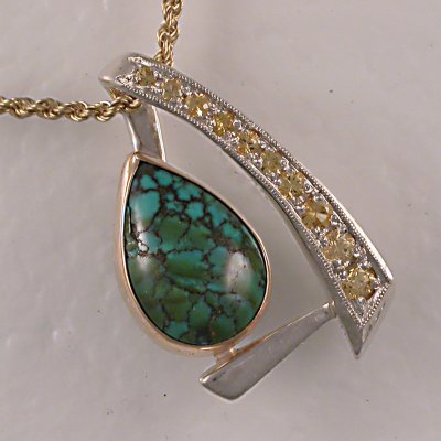 Original Silver and 14KT slide w/turquoise and yellow sapphires