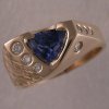 One of a Kind trilliant cut sapphire and diamond ring
