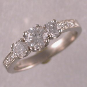 Custom made 14KT white ring with 3 diamonds