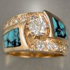 Custom designed and created ladies ring.  14KTY, diamonds, turqpuoise