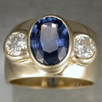18KT white gold ring/sapphire & diamonds