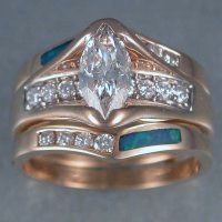 Custom Wedding Ring Guards shown with Center Ring