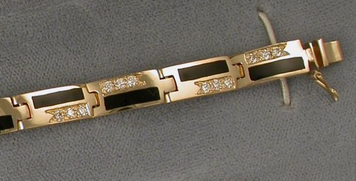 JM123-14KY link bracelet with channel set diamonds and solid stone onyx inlay