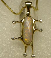 14KT yellow pendant with Australian Opal cab and diamonds
